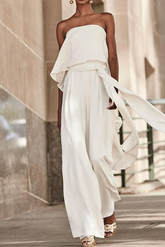 white jumpsuit with cape